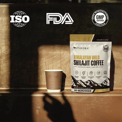 Vitavora Wellness product page trust layout displaying white ISO logo, FDA compliance text, and GMP Certified Good Manufacturing Practice stamps above a stand-up pouch of Himalayan Wild Shilajit Coffee next to a paper cup.